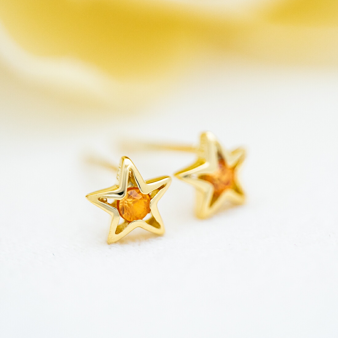 umu -アム- FINE JEWELRY STUIDIOオレンジサファイア スターモチーフ スタッドピアスpi0052_1.jpg
