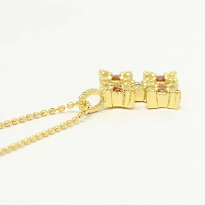 umu -アム- FINE JEWELRY STUIDIOマンダリンガーネット クロス ペンダントトップ 「alone」pn0259_s.jpg