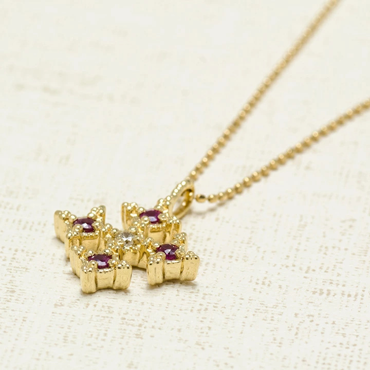 umu -アム- FINE JEWELRY STUIDIOルビー ダイヤ クロス ペンダントトップ 「alone」pn0266_kanban2.jpg