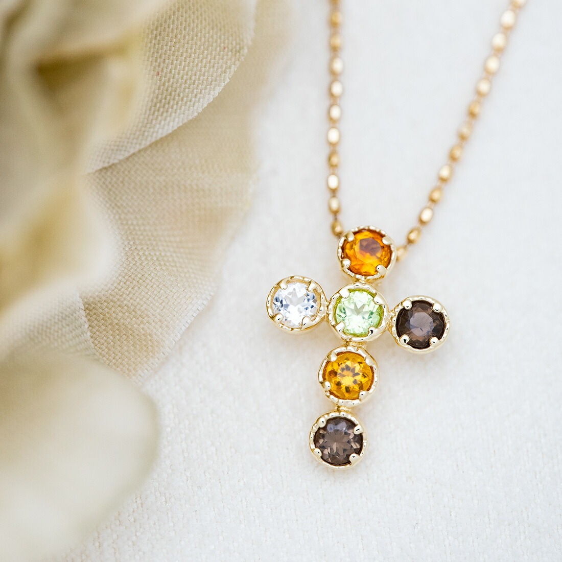 umu -アム- FINE JEWELRY STUIDIOアースカラー クロスモチーフ ペンダントトップ 「dolce」pn0286_1.jpg