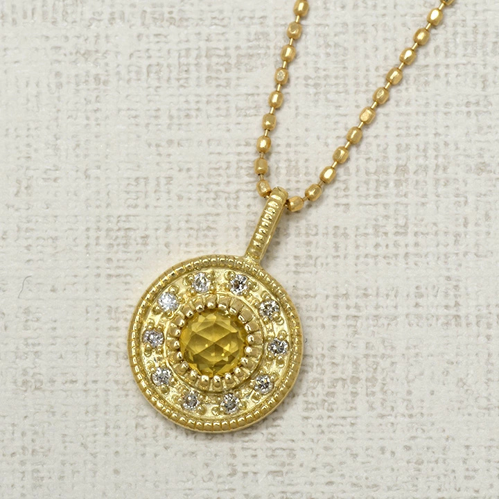 umu -アム- FINE JEWELRY STUIDIOイエローサファイア ダイヤ ペンダントトップ 「cosmo」pn0299_kanban2.jpg