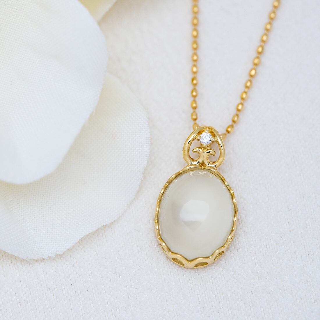 umu -アム- FINE JEWELRY STUIDIOムーンストーン ダイヤモンド ペンダントトップ 「doma」pn0359_1.jpg