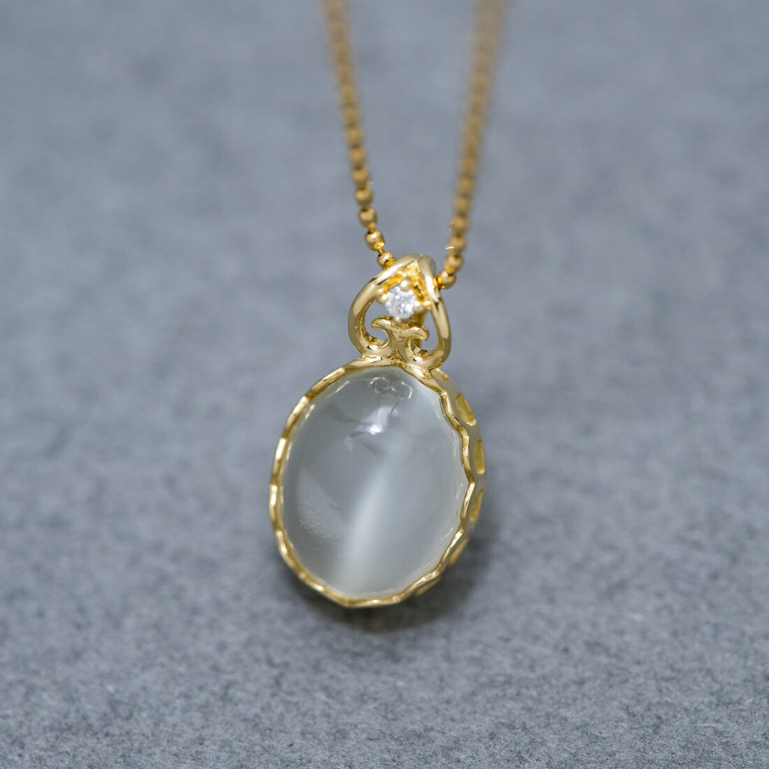 umu -アム- FINE JEWELRY STUIDIOムーンストーン ダイヤモンド ペンダントトップ 「doma」pn0359_kanban2.jpg