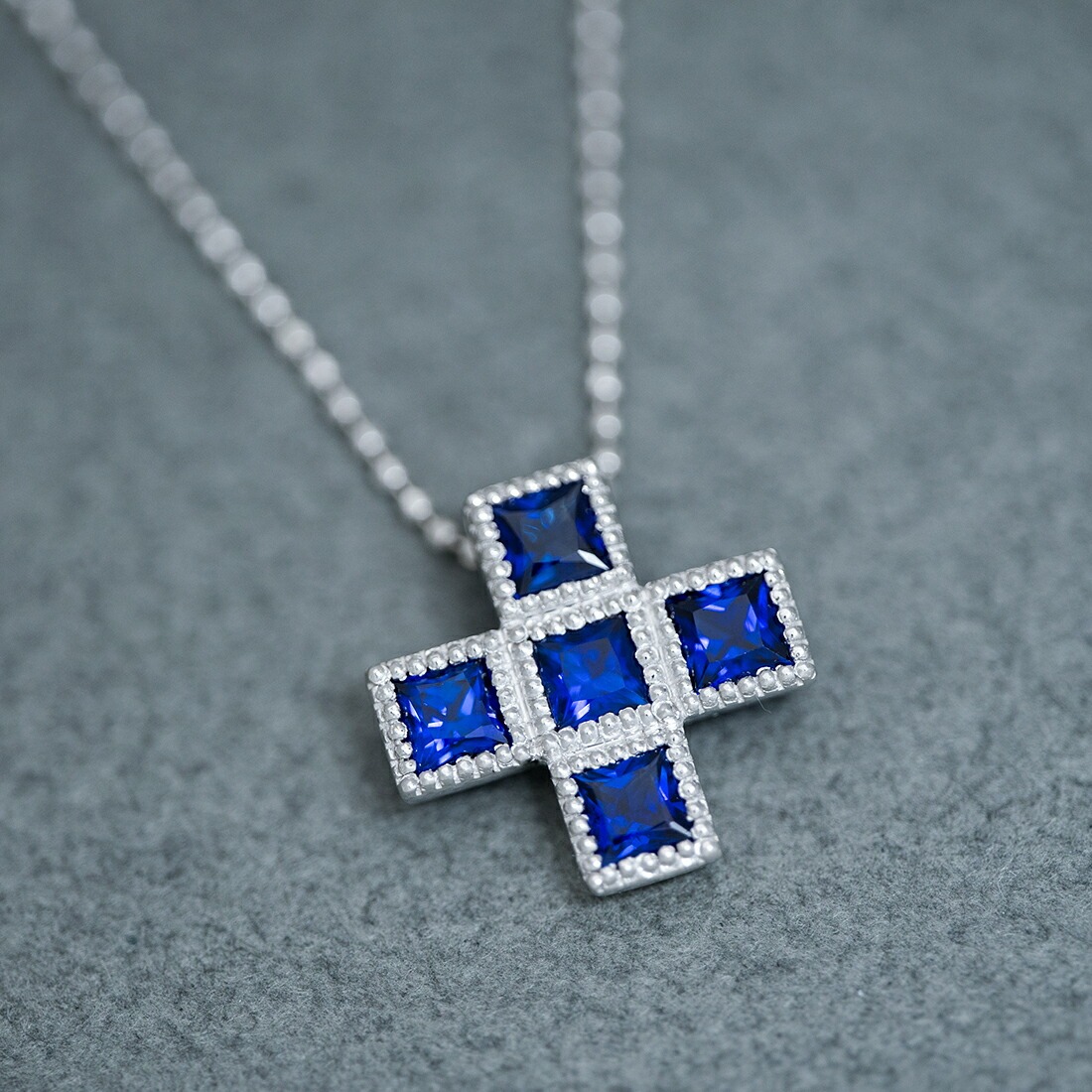 umu -アム- FINE JEWELRY STUIDIOK18 ブルーサファイア クロスモチーフ ペンダントトップ 「tin」pn0365_kanban2.jpg