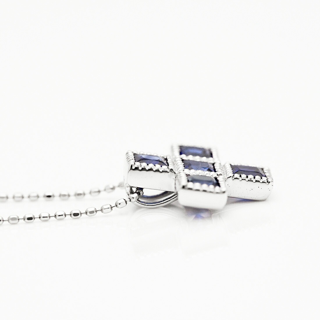 umu -アム- FINE JEWELRY STUIDIOK18 ブルーサファイア クロスモチーフ ペンダントトップ 「tin」pn0365_s.jpg