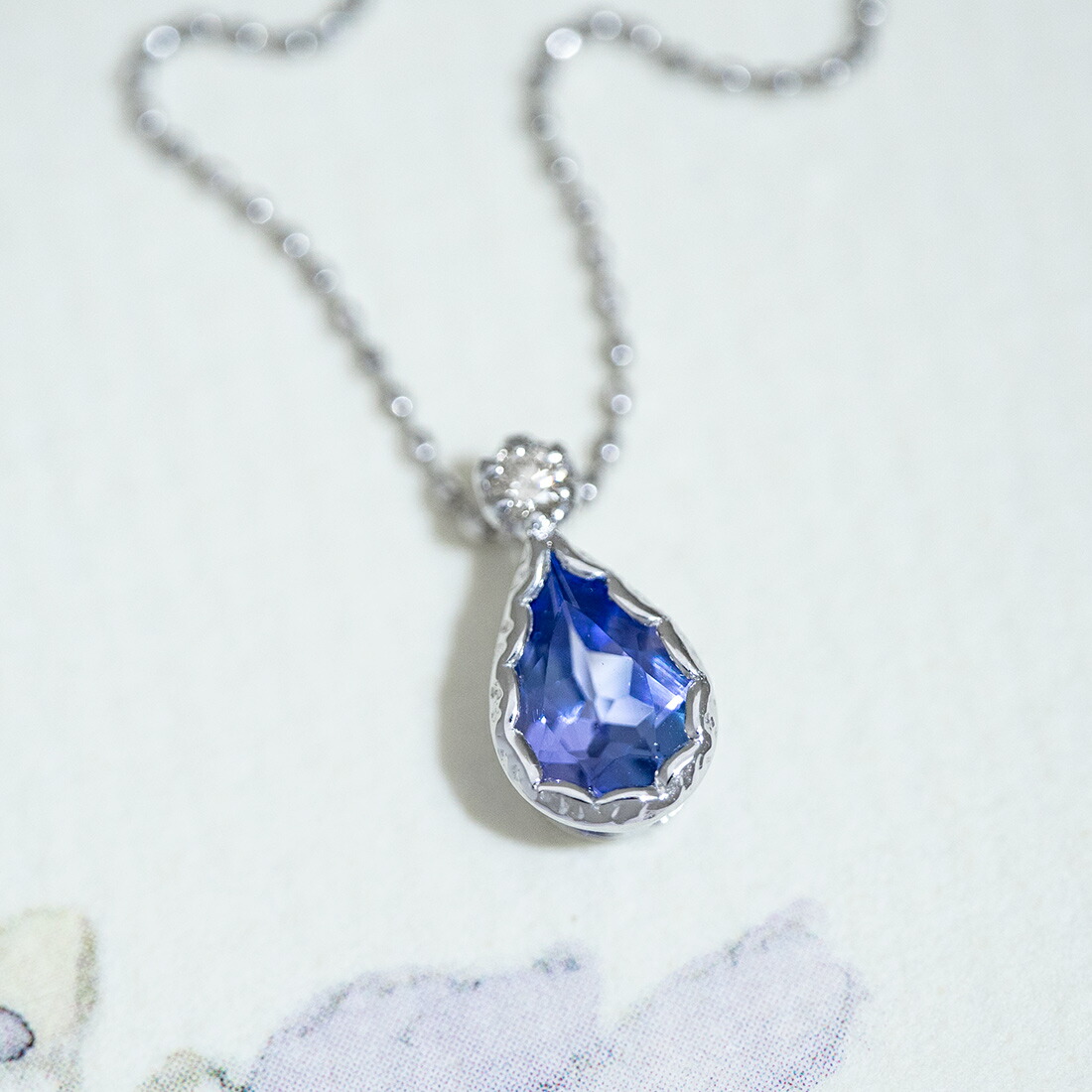 umu -アム- FINE JEWELRY STUIDIOタンザナイト ダイヤモンド ペンダントトップ 「goccia」pn0422_kanban2.jpg