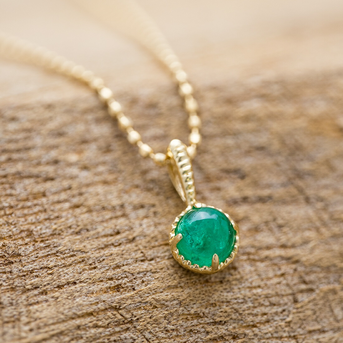 umu -アム- FINE JEWELRY STUIDIOカボション エメラルド ペンダントトップ 「amaretto」pn0445_kanban2.jpg