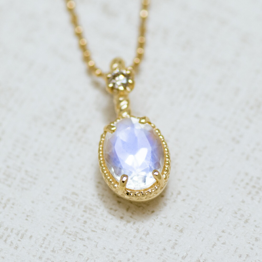 umu -アム- FINE JEWELRY STUIDIOブルームーンストーン ダイヤ ペンダントトップ 「spaiato」pn0452_kanban2.jpg