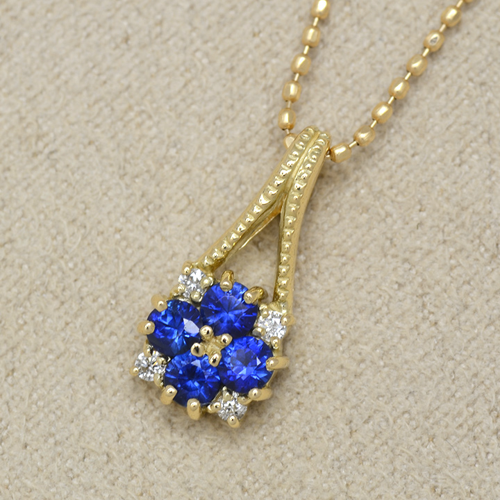 umu -アム- FINE JEWELRY STUIDIOブルーサファイア ダイヤモンド ペンダントトップ 「bouquet」pn0468_kanban2.jpg