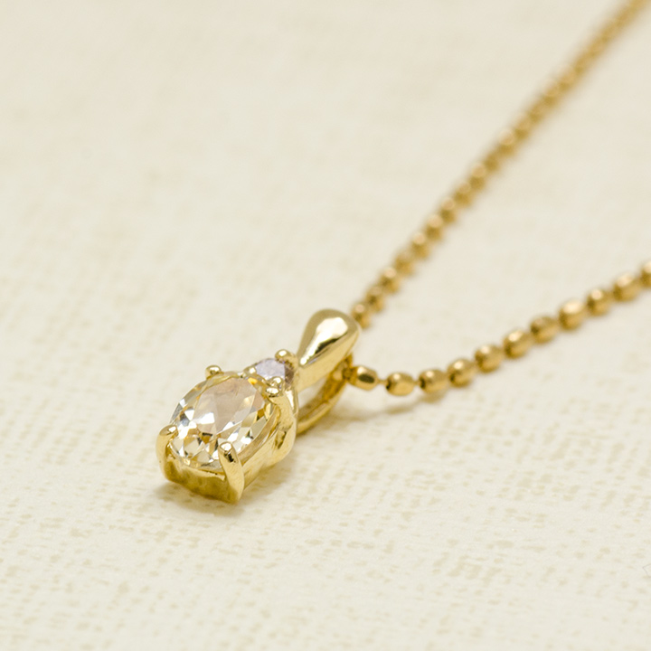 umu -アム- FINE JEWELRY STUIDIOK18 グロッシュラーライトガーネット ペントップ 「calzare」pn0751_kanban2.jpg