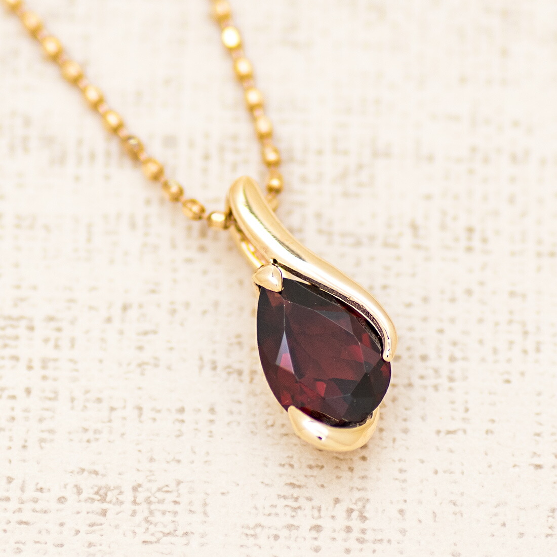 umu -アム- FINE JEWELRY STUIDIOガーネット ペンダントトップpn0969_kanban2.jpg