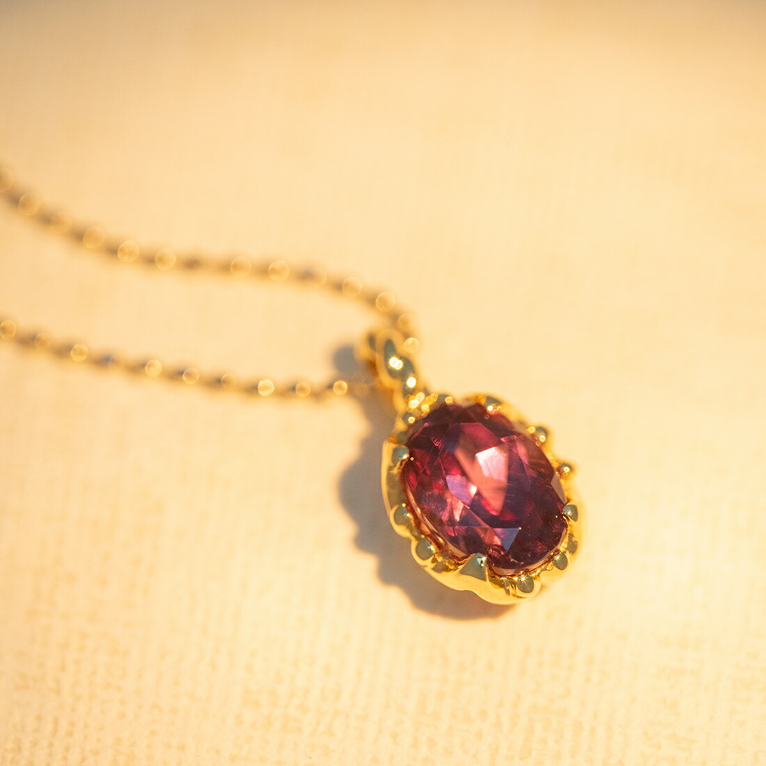 umu -アム- FINE JEWELRY STUIDIOカラーチェンジガーネット ペンダントトップ 「fresco」pn0986_kanban2.jpg