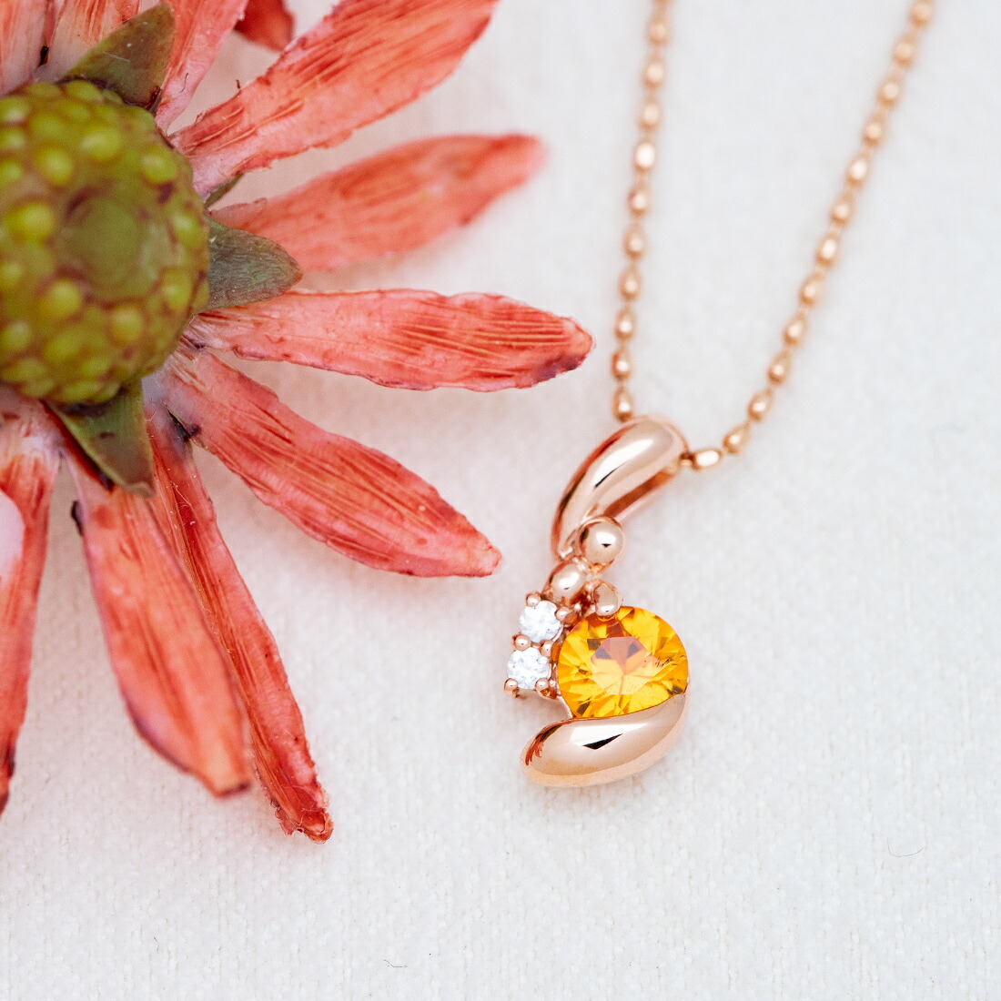 umu -アム- FINE JEWELRY STUIDIOオレンジサファイア ダイヤモンド ペンダントトップpn0989_1.jpg