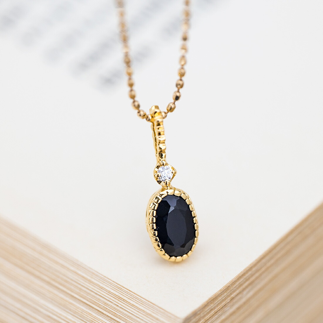 umu -アム- FINE JEWELRY STUIDIOオニキス ダイヤモンド ペンダントトップpn1018_kanban2.jpg