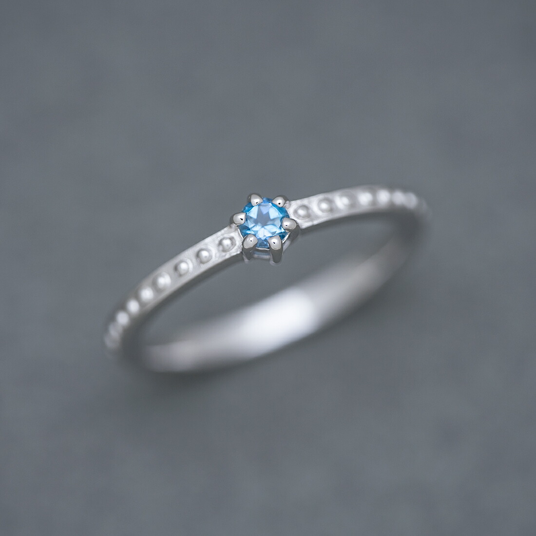 umu -アム- FINE JEWELRY STUIDIOサンタマリアアクアマリン リング 「parca」rg0408_kanban2.jpg