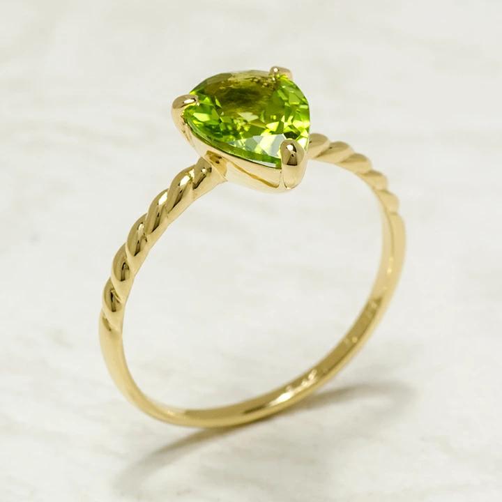 umu -アム- FINE JEWELRY STUIDIOペリドット リング 「flare」rg0961_kanban2.jpg