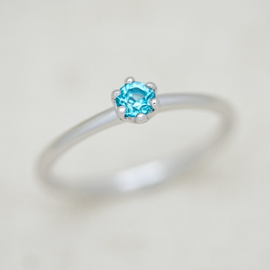 umu -アム- FINE JEWELRY STUIDIOブルージルコン ミルククラウン リングrg1491_kanban2.jpg